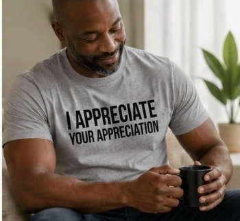 Man wearing I Appreciate Your Appreciation tee holding a mug